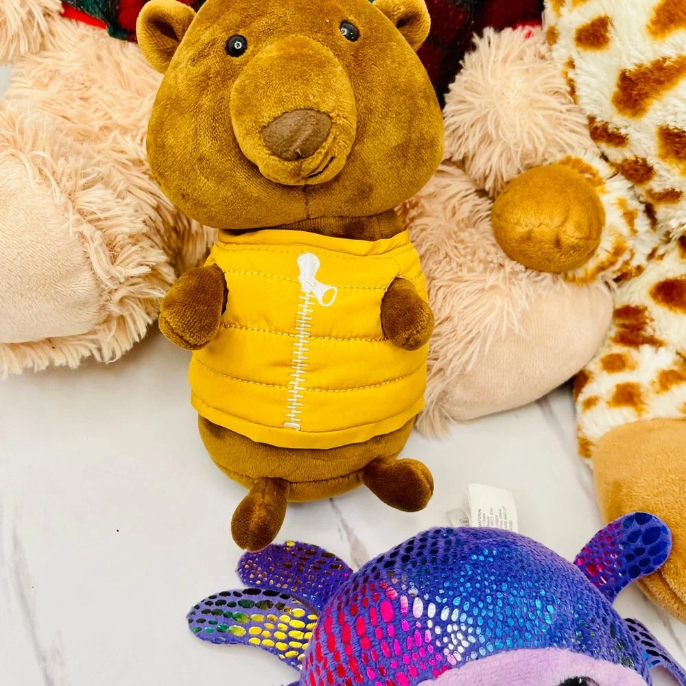 A lot of four Plush Giraffe, Tadebeare, Pig, and Fish Toy Set